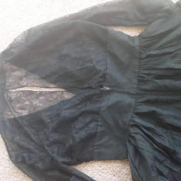 A crinkled black skirt bottom with lace top and long sleeves by En Francais - Picture 3 of 5